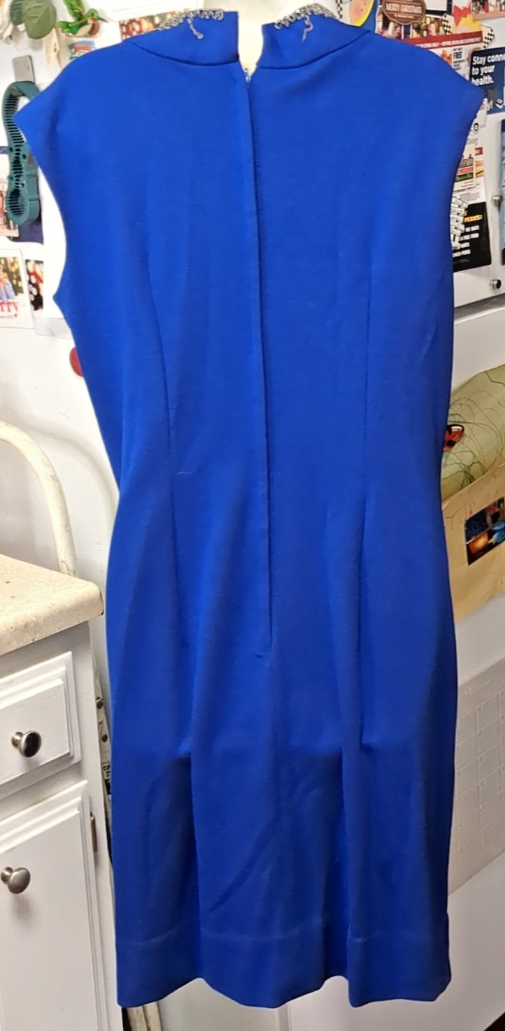 Sydney North designed, Hollywood Glamour, Striking V-neck blue party dress