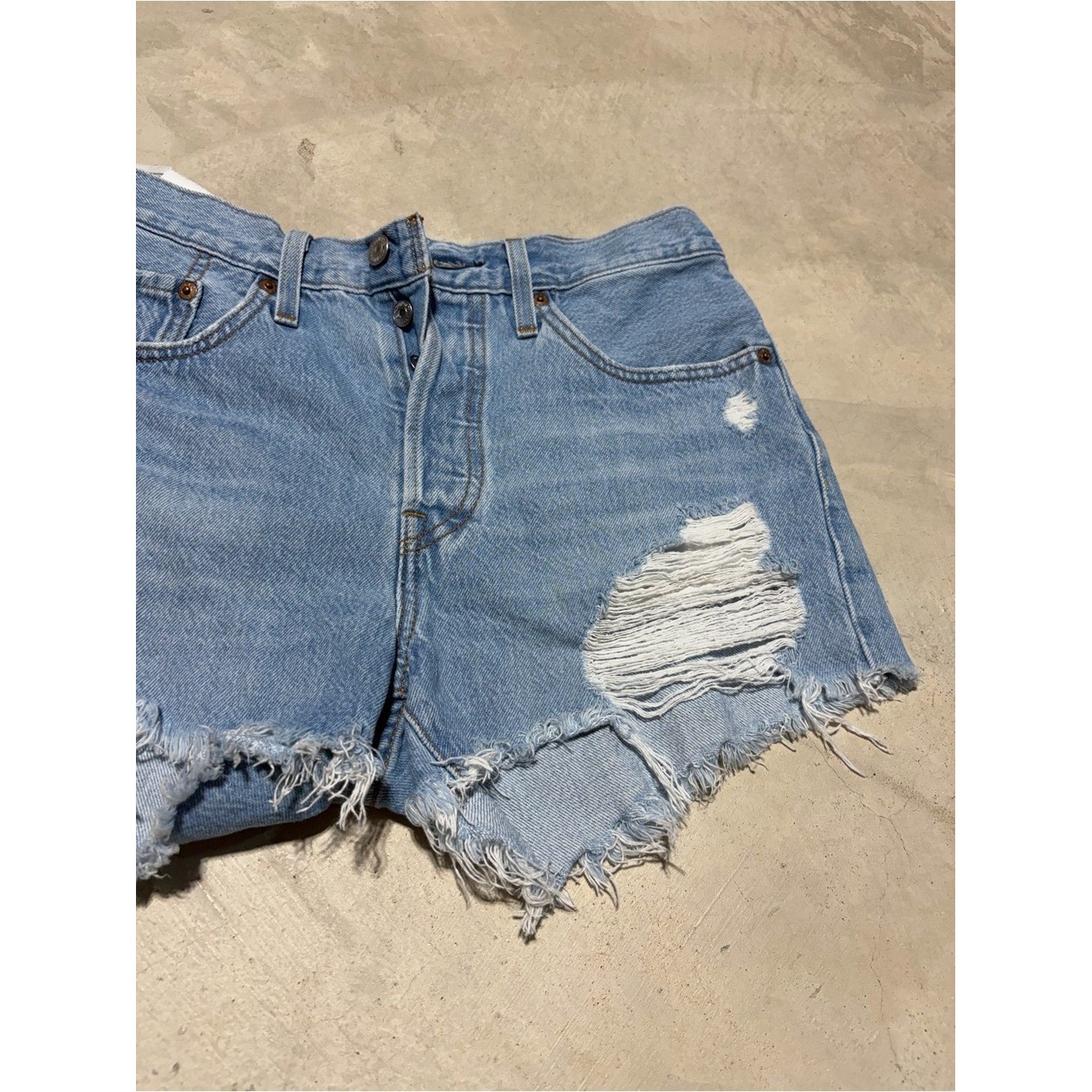 Levi&rsquo;s 501 Light Blue Distressed Denim Shorts button fly 27
