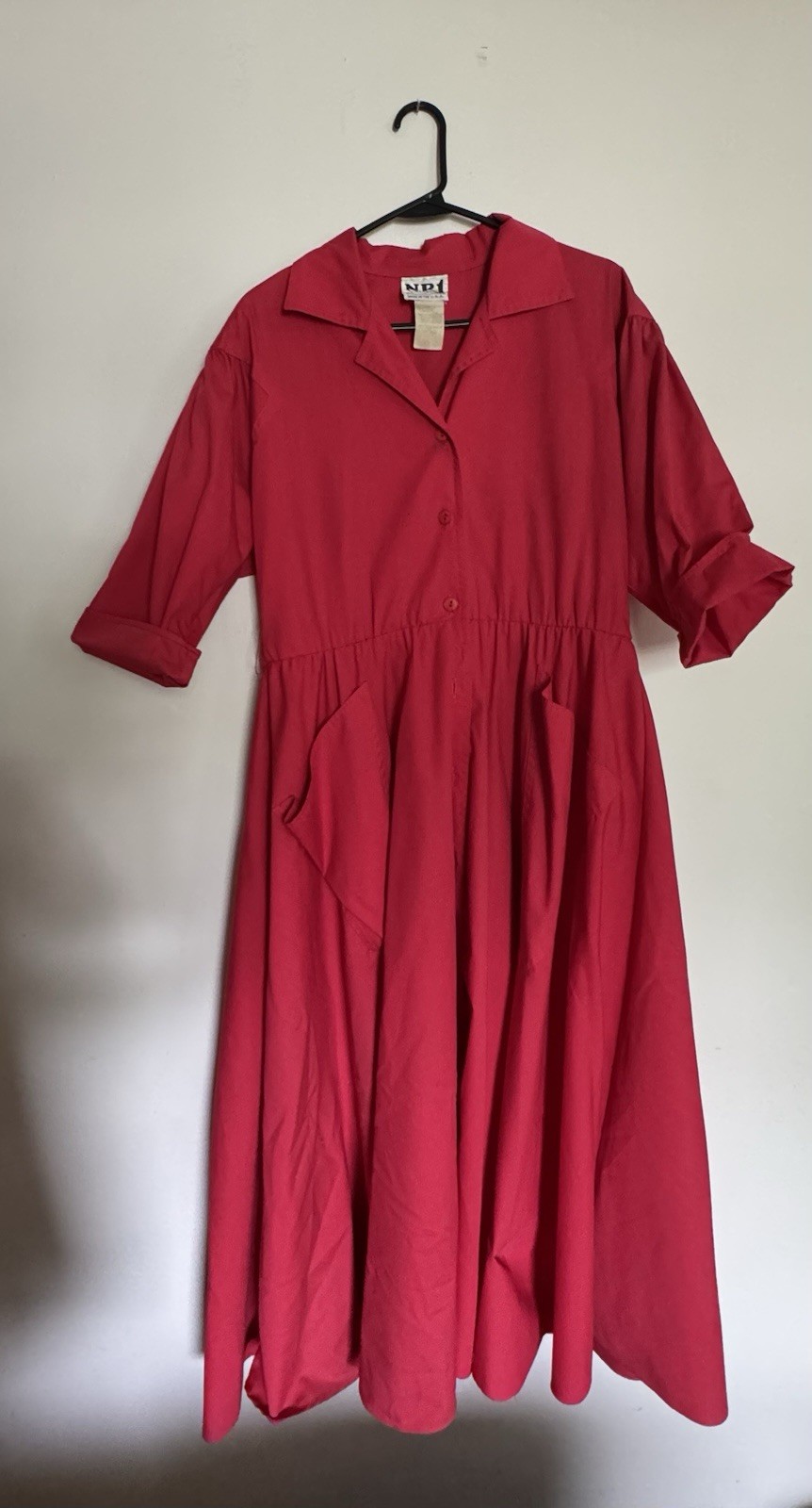 Red vintage 70s cotton midi dress with pockets and button up front. Size: 10