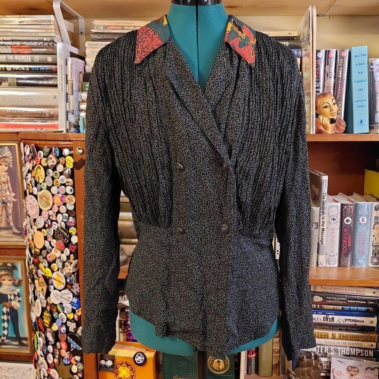 Vintage green and black leap pattern with a orange patterned collar button top.