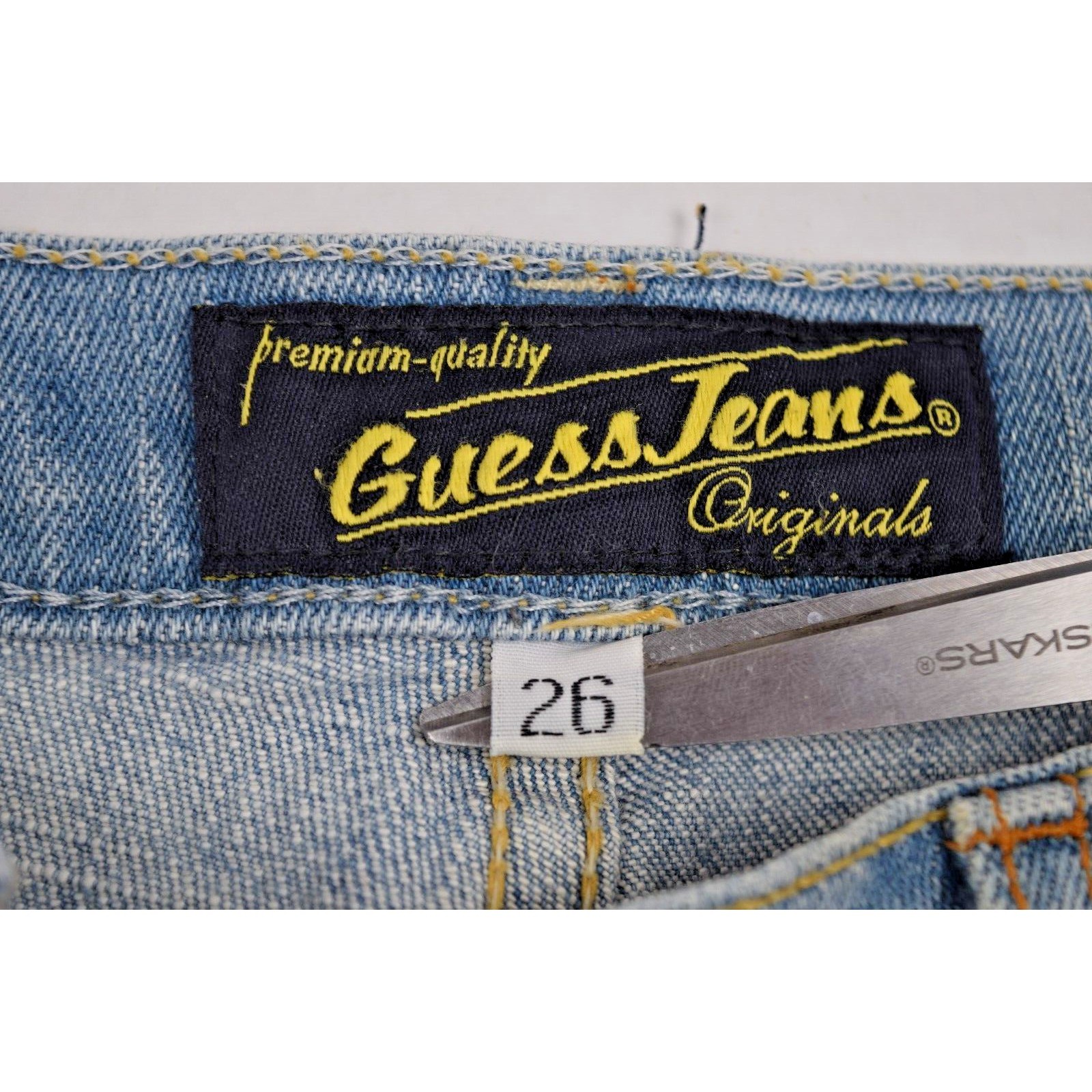 Vintage Guess Jeans Size 26 x 31.5 90s Light Blue Fade Low Rise Flare Made USA