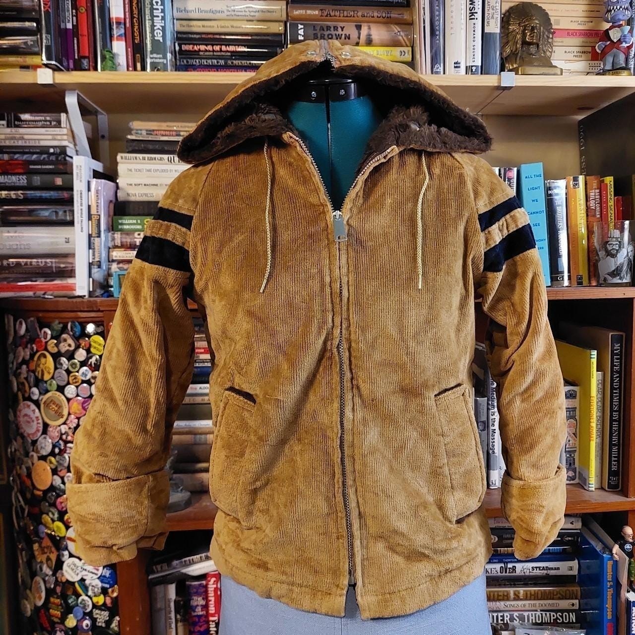 Vintage brown and black corduroy jacket with zip up hood.