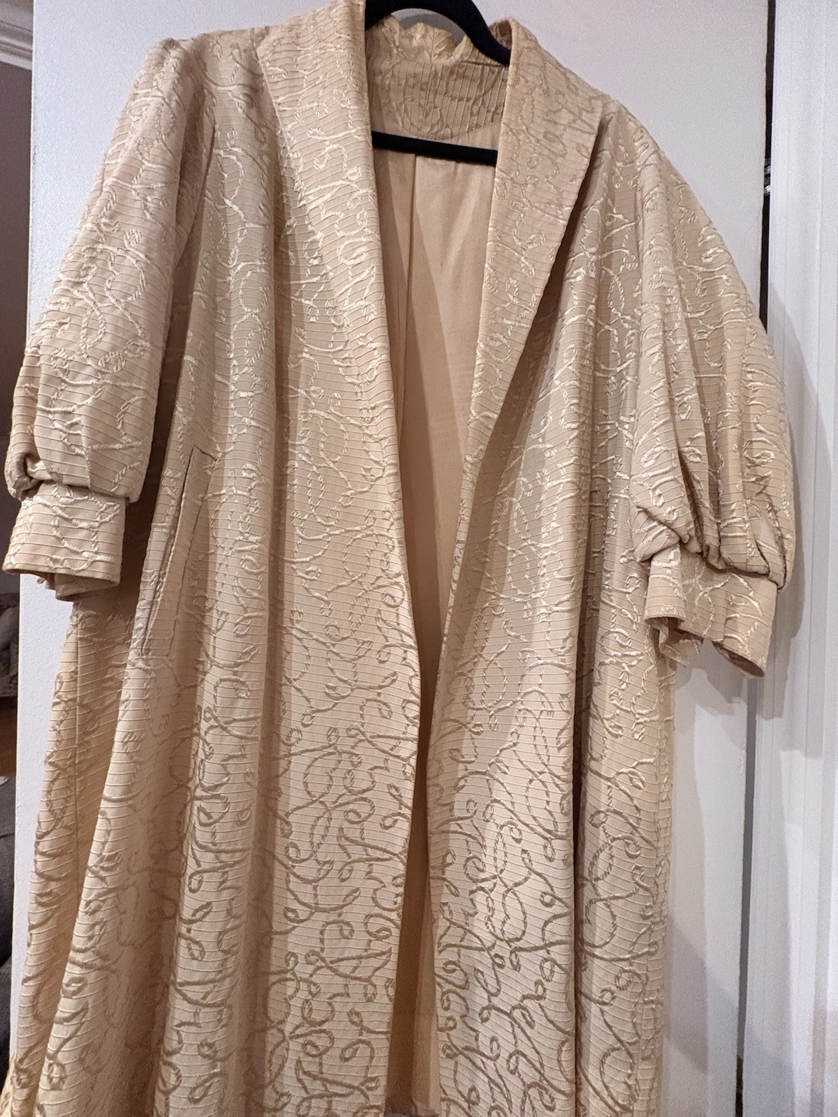 Elegant vintage beige coat with beautiful subtle embroidered scroll pattern