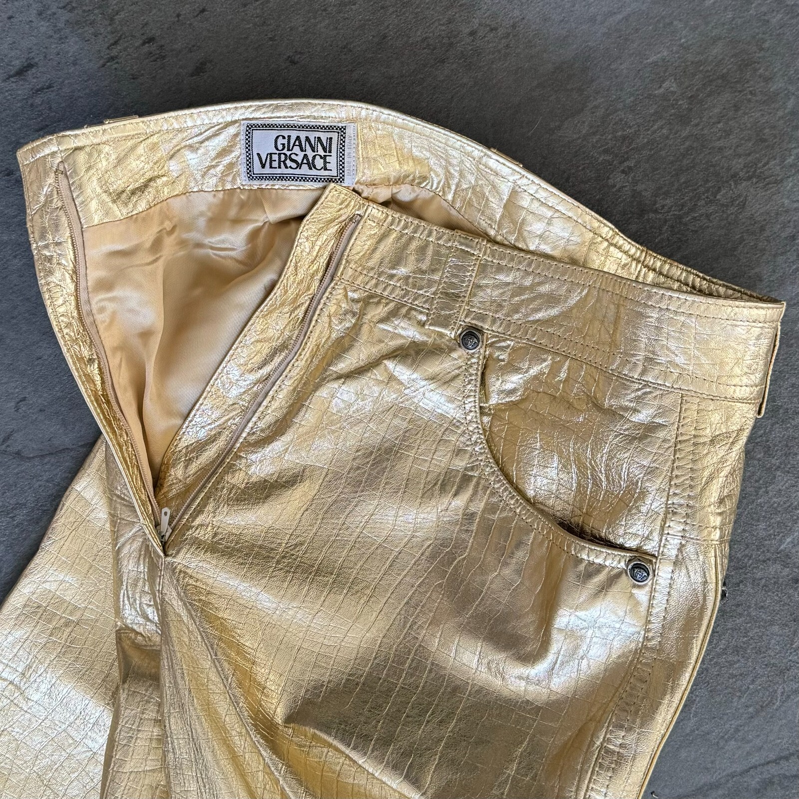 GIANNI VERSACE metallic gold leather pants size IT 40/42 from F/W 1994/95