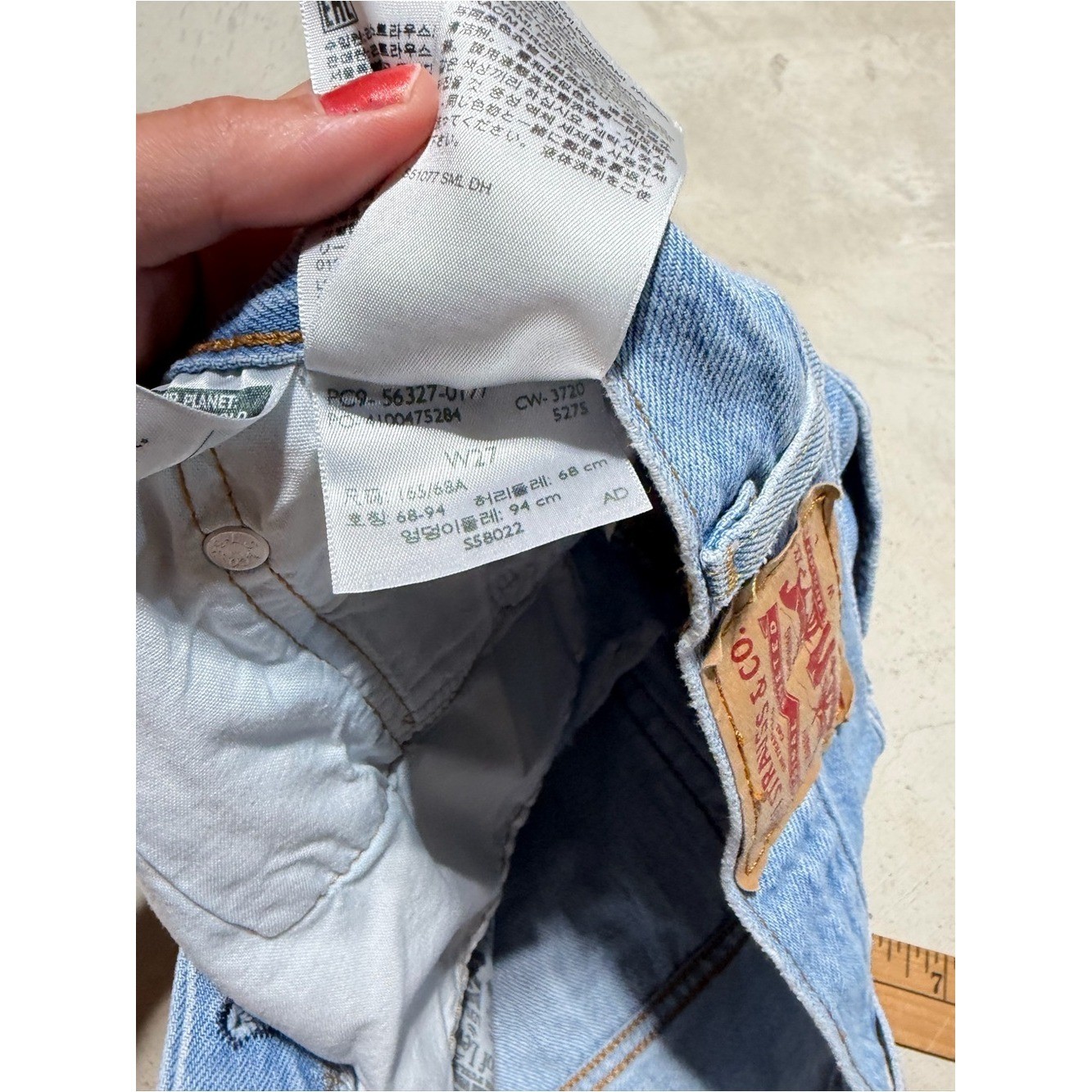 Levi&rsquo;s 501 Light Blue Distressed Denim Shorts button fly 27