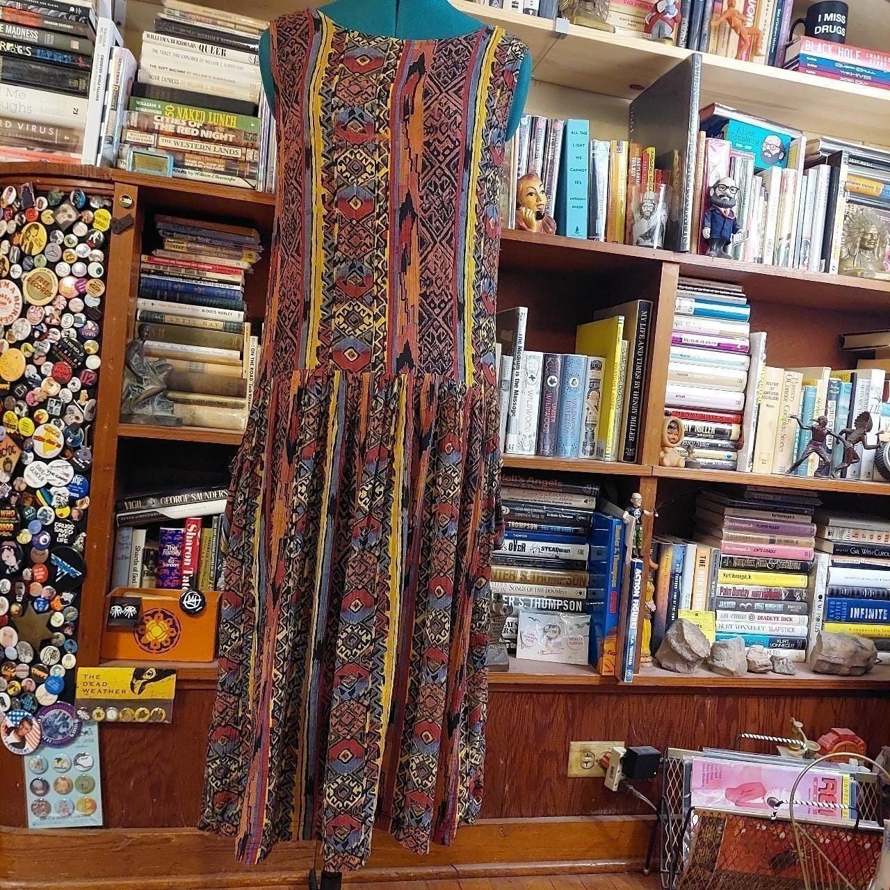 Vintage multicolored patterned dress with drop waist.
