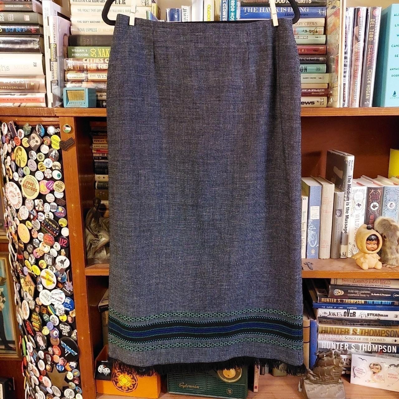 Vintage grey skirt with blue, black, and gold stripe with a black fringe hem