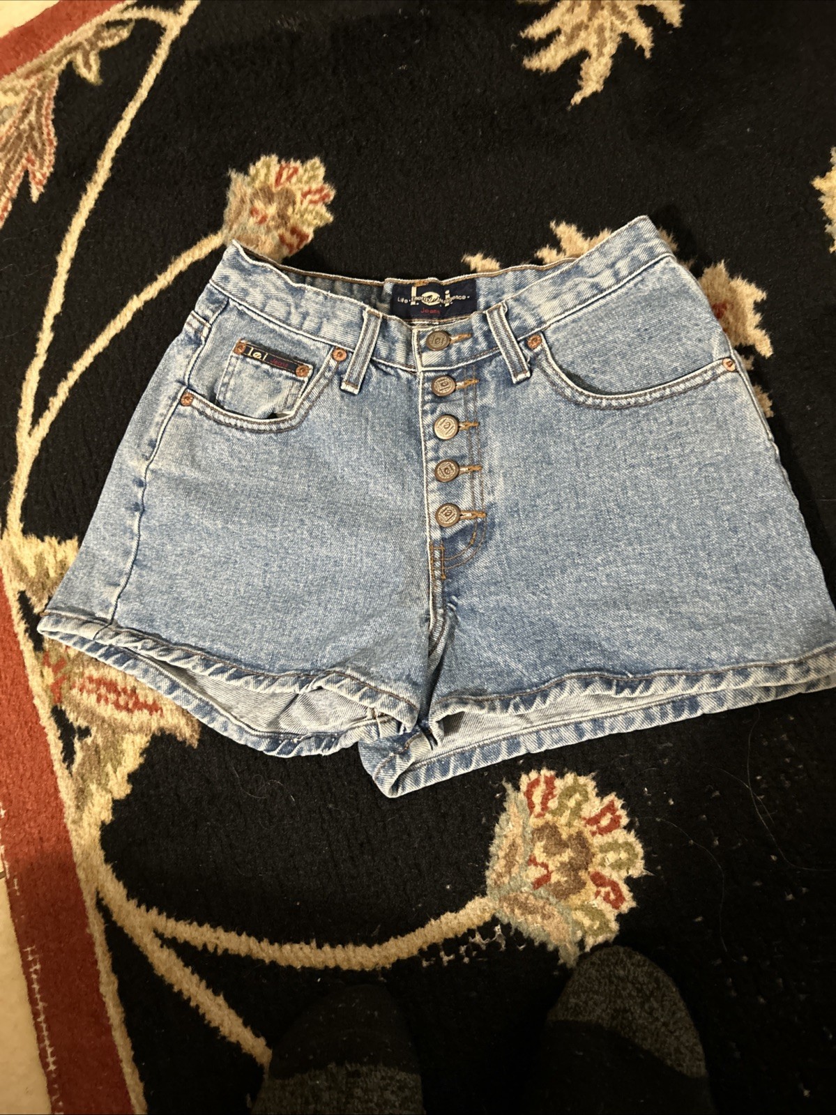 VNTG. l.e.i. Denim Short Shorts~5 Pocket~5 Tab Buttons~27” Waist~13” Length~EXC