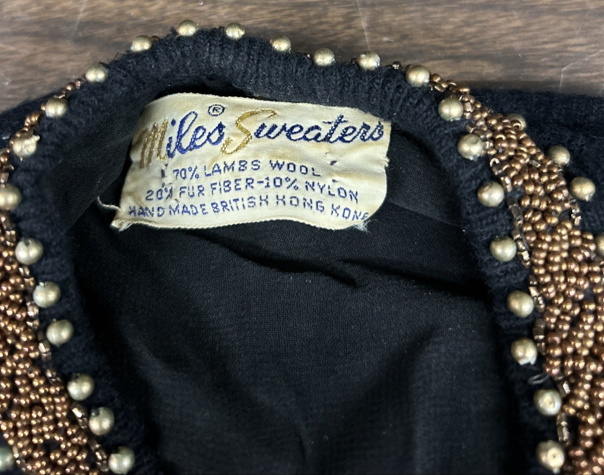MILES SWEATER 70% LAMBS WOOL 20% FUR FIBER 10% NYLON COPPER BEADED SWEATER
