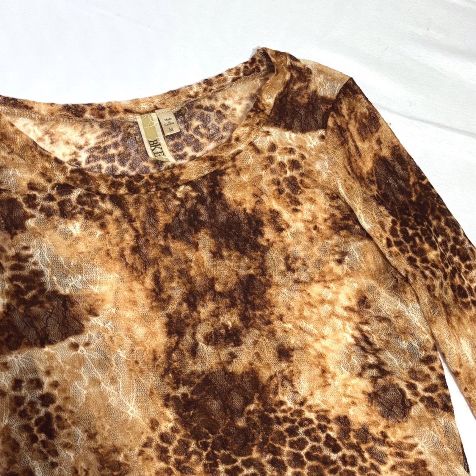 BKE Stunning vintage Y2k long sleeve sheer top with leopard print design