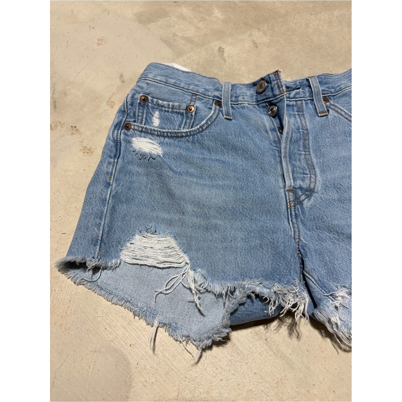 Levi&rsquo;s 501 Light Blue Distressed Denim Shorts button fly 27