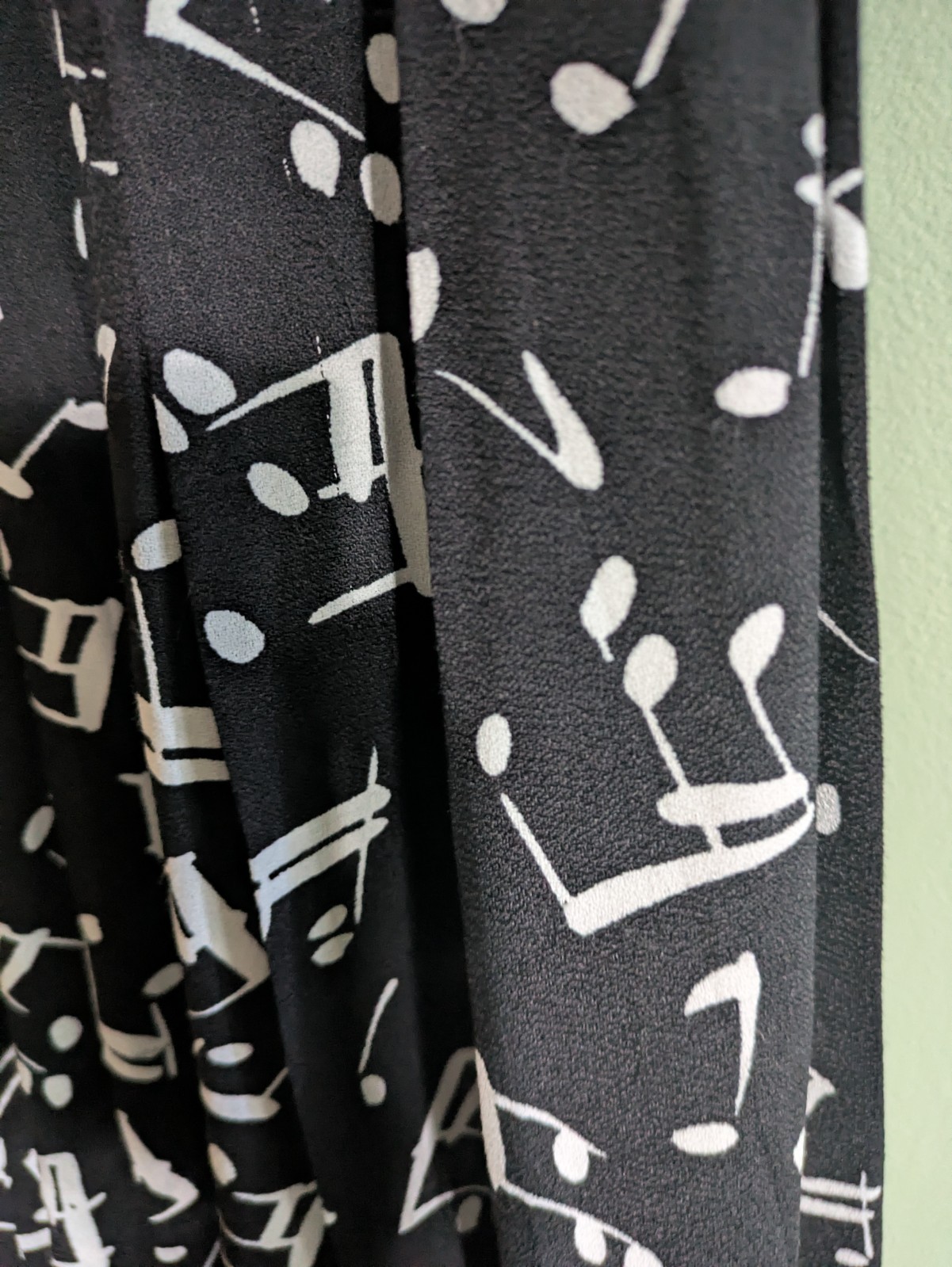 vintage Saint Laurent Rive Gauche pleated skirt, music-note print, fall 1982
