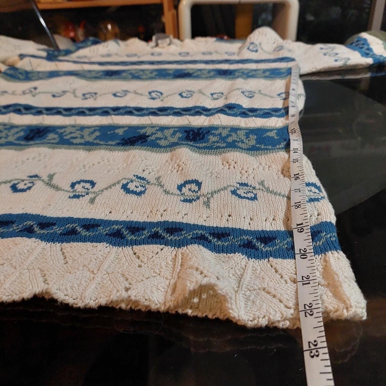 Vintage blue, green, and white striped sweater.
