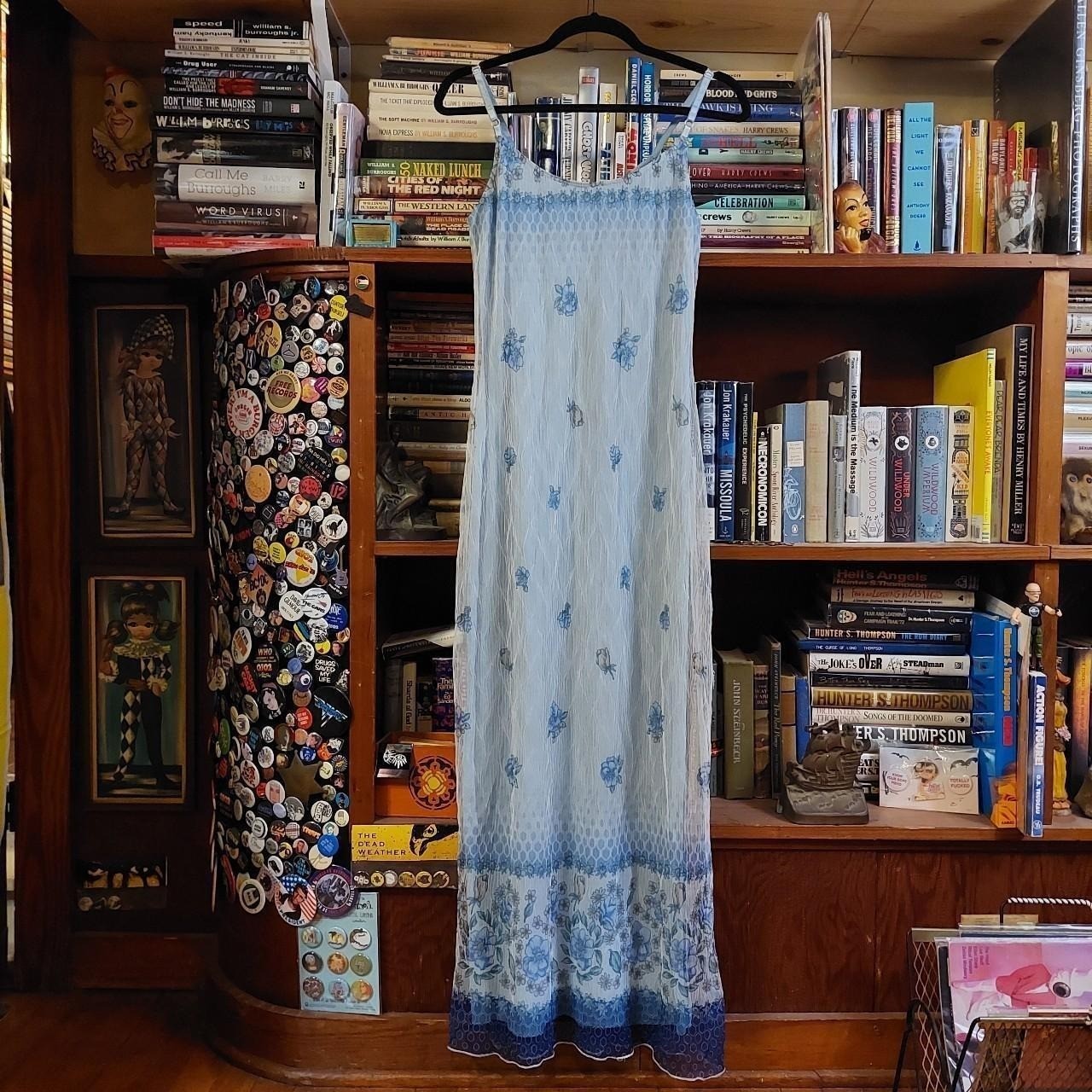 Vintage light blue floral floor length dress with adjustable straps.