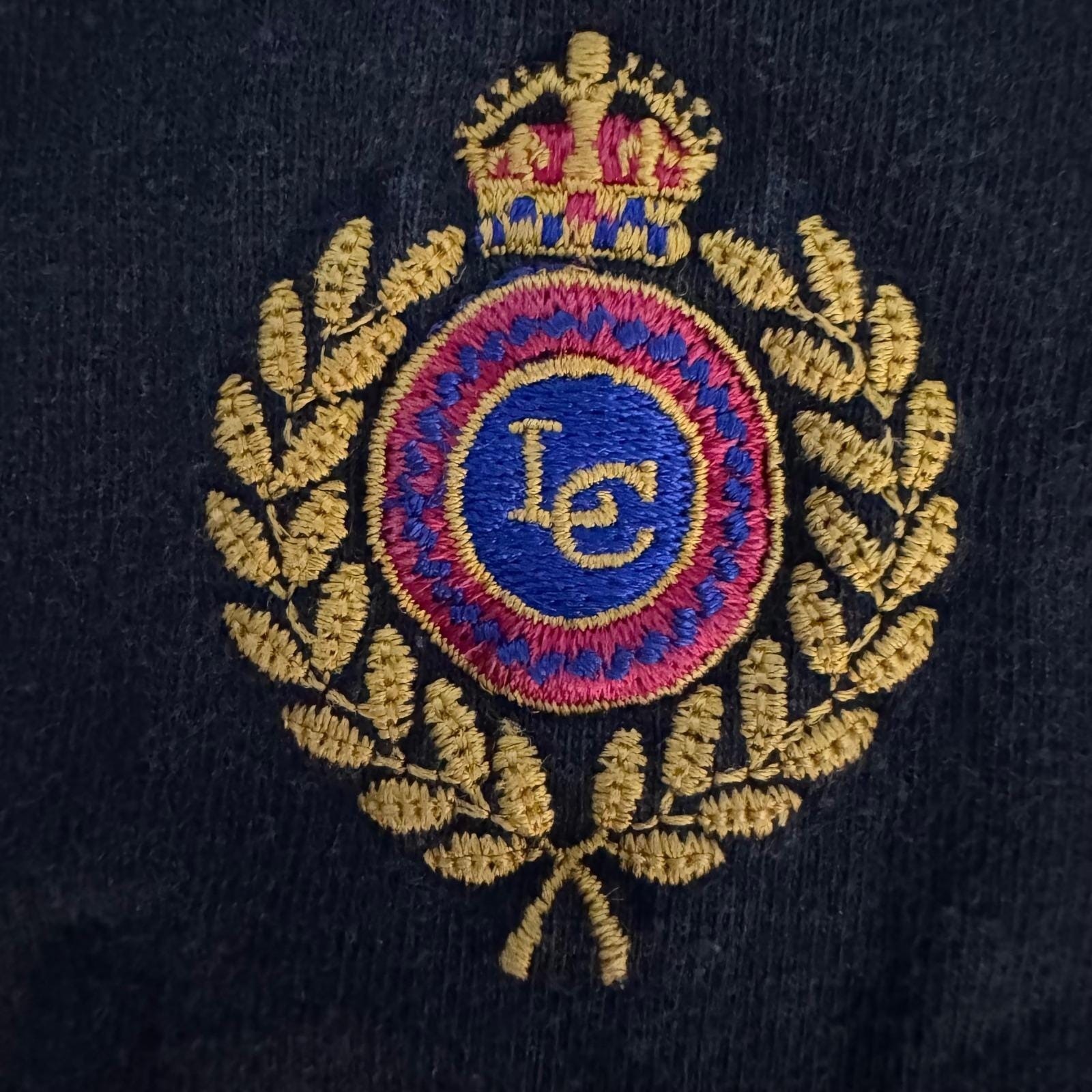 Vintage 90&rsquo;s Medium Single Stitch Black faded Liz Sport Embroidered crest tshirt