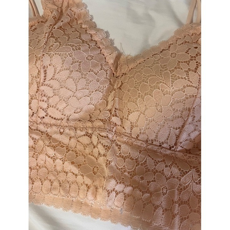 peach Y2K lacy bralette.