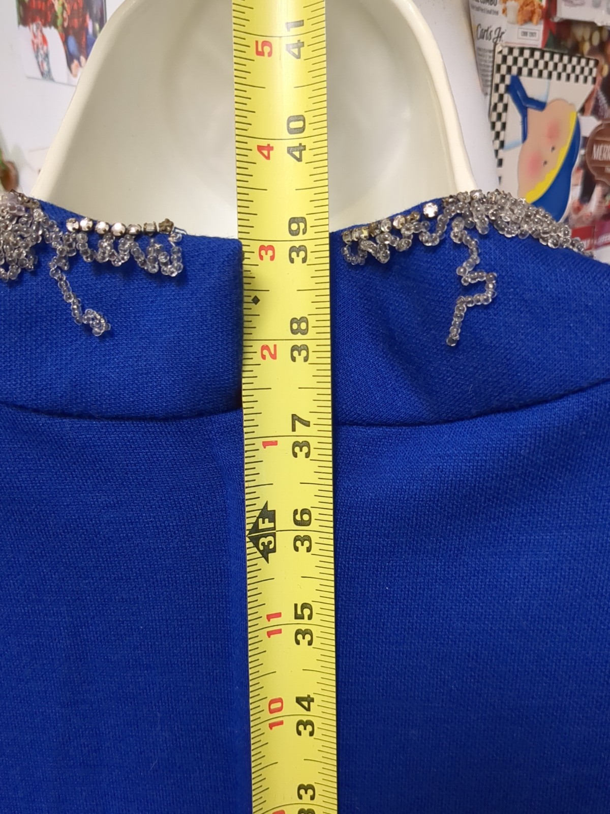 Sydney North designed, Hollywood Glamour, Striking V-neck blue party dress
