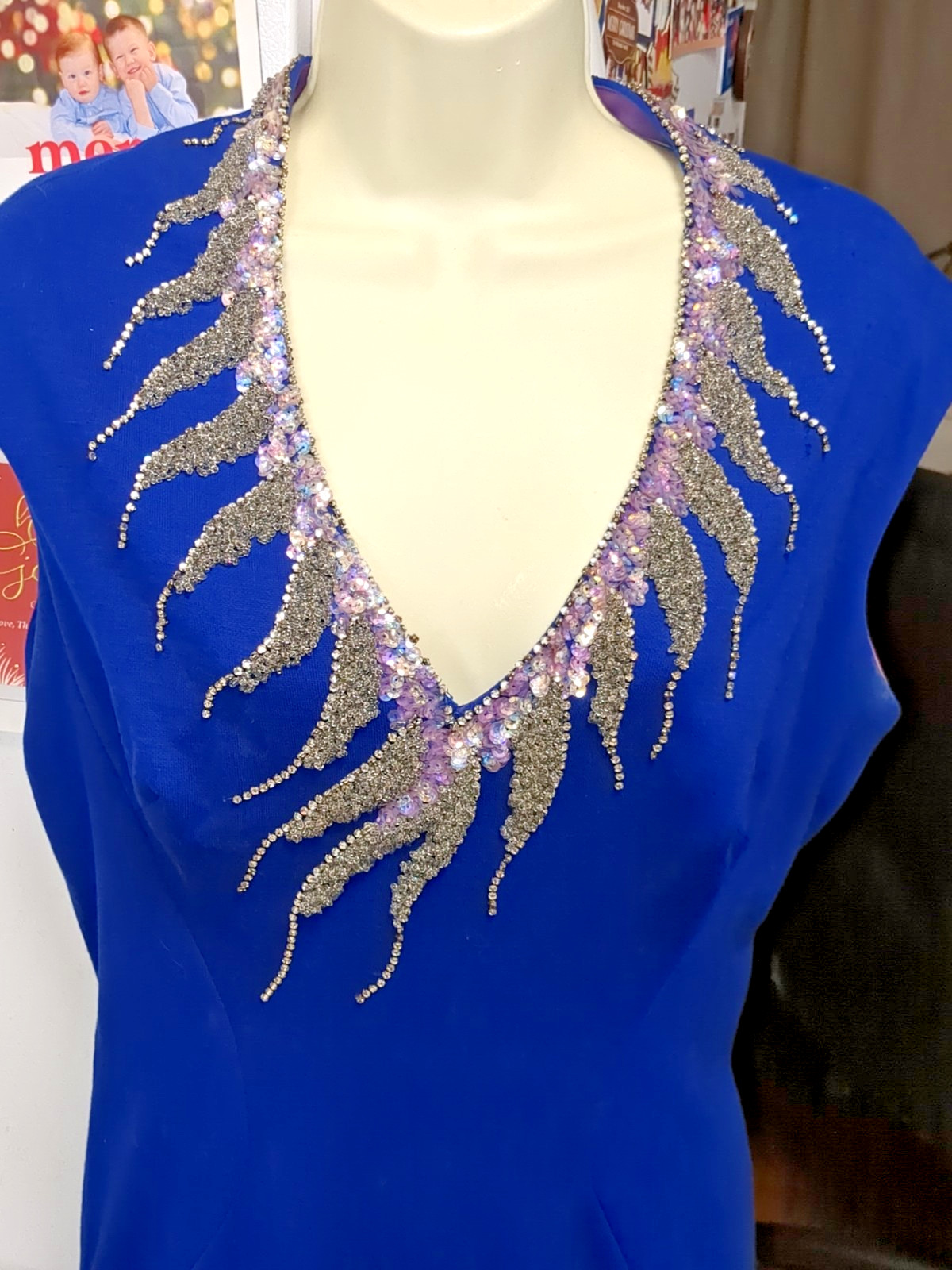 Sydney North designed, Hollywood Glamour, Striking V-neck blue party dress