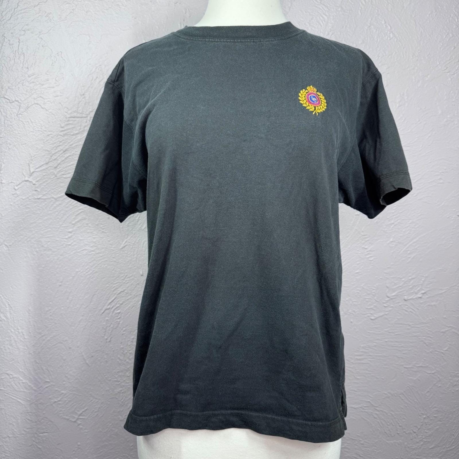 Vintage 90&rsquo;s Medium Single Stitch Black faded Liz Sport Embroidered crest tshirt